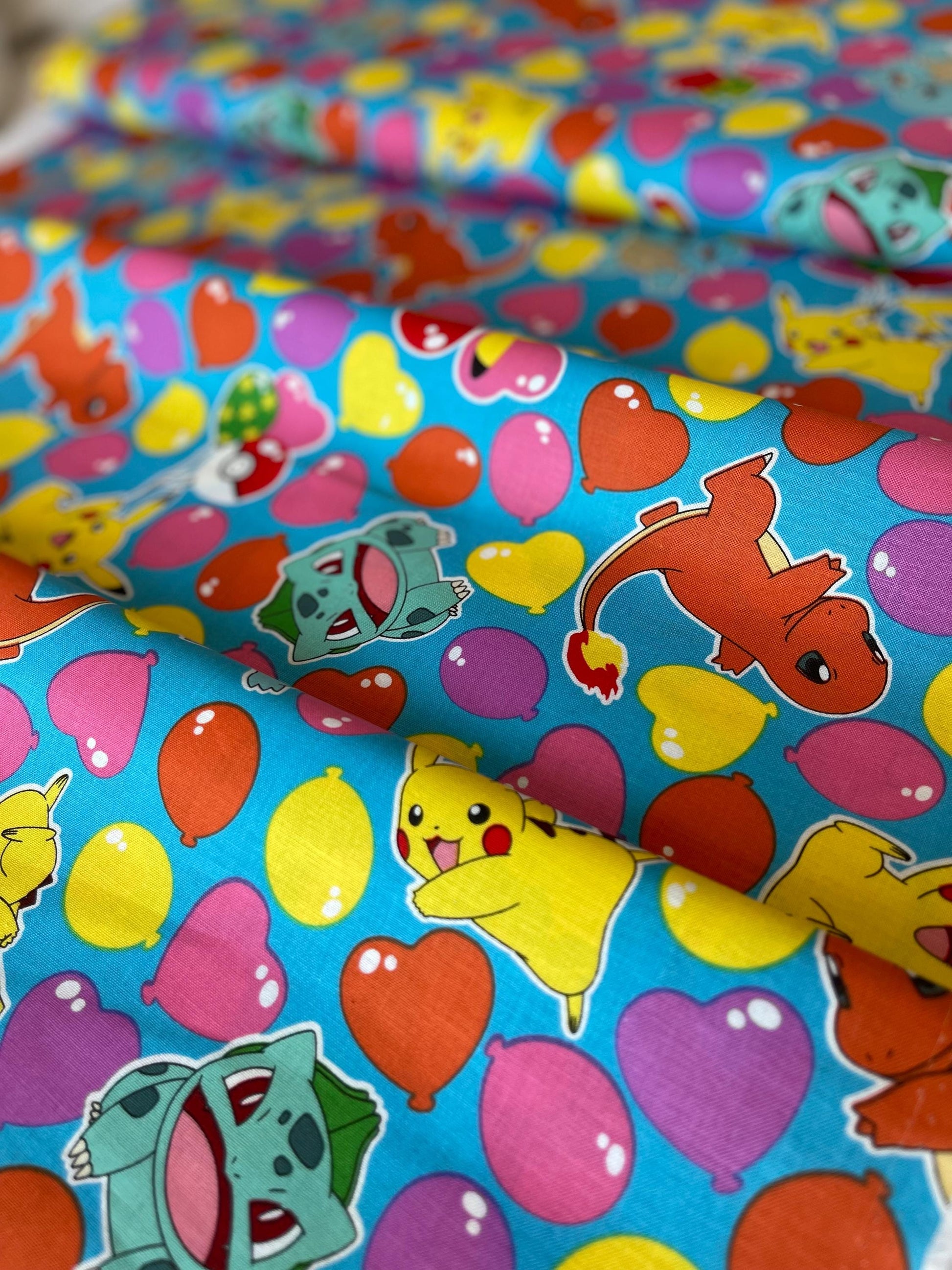 Pikachu Balloons Fabric by the Yard – Vibrant Colorful Pokemon Sky Print for Kids & Crafts